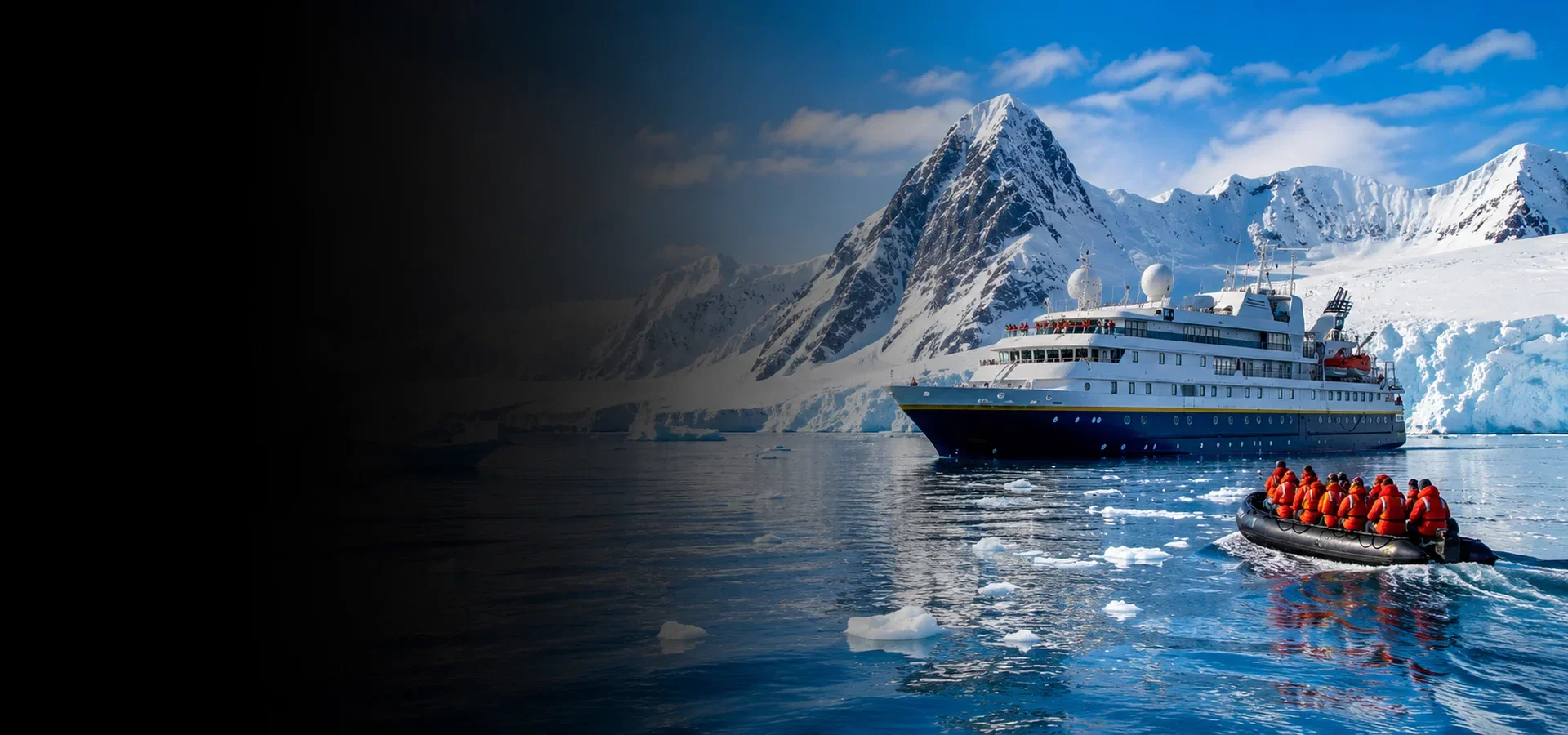 Expedition cruise ship sailing near icebergs in Antarctica