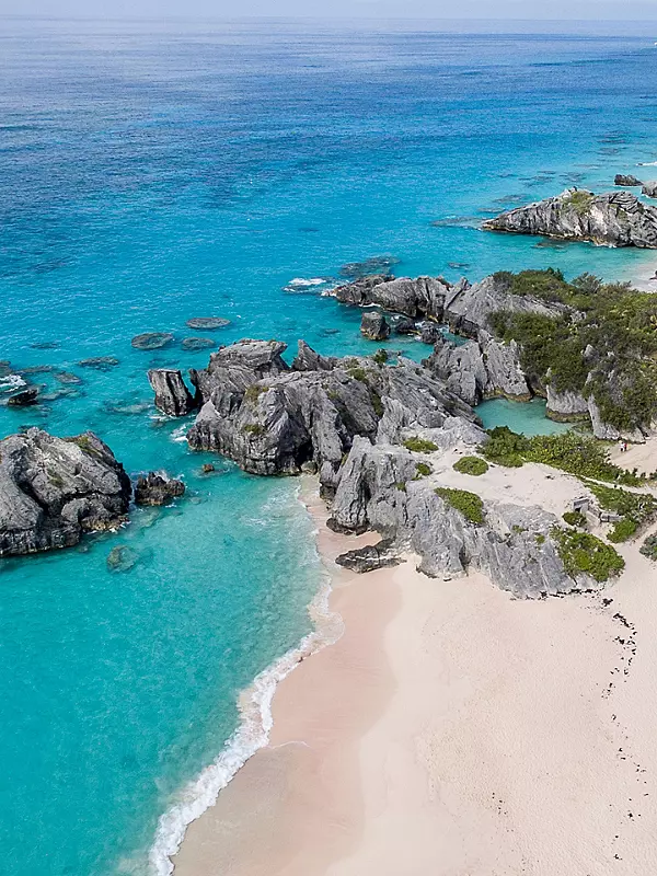 Cruise ship visiting Bermuda with pink sand beaches and blue water